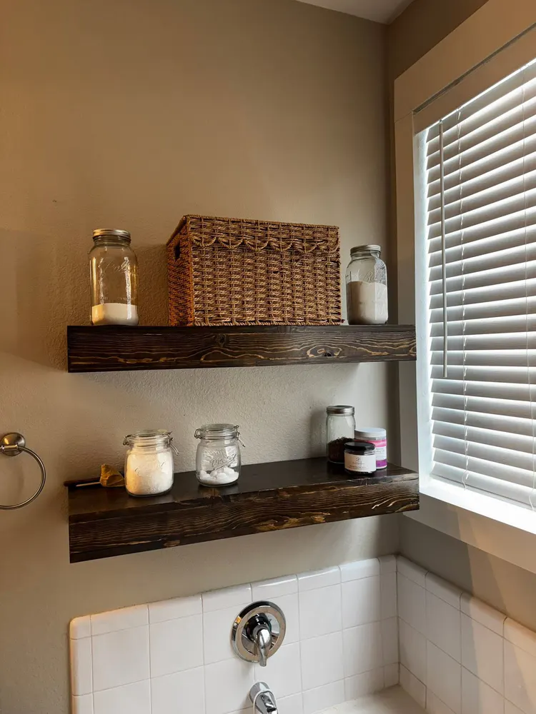 Finished shelving from the floating shelf installation documented by Chavanelle Built Co.